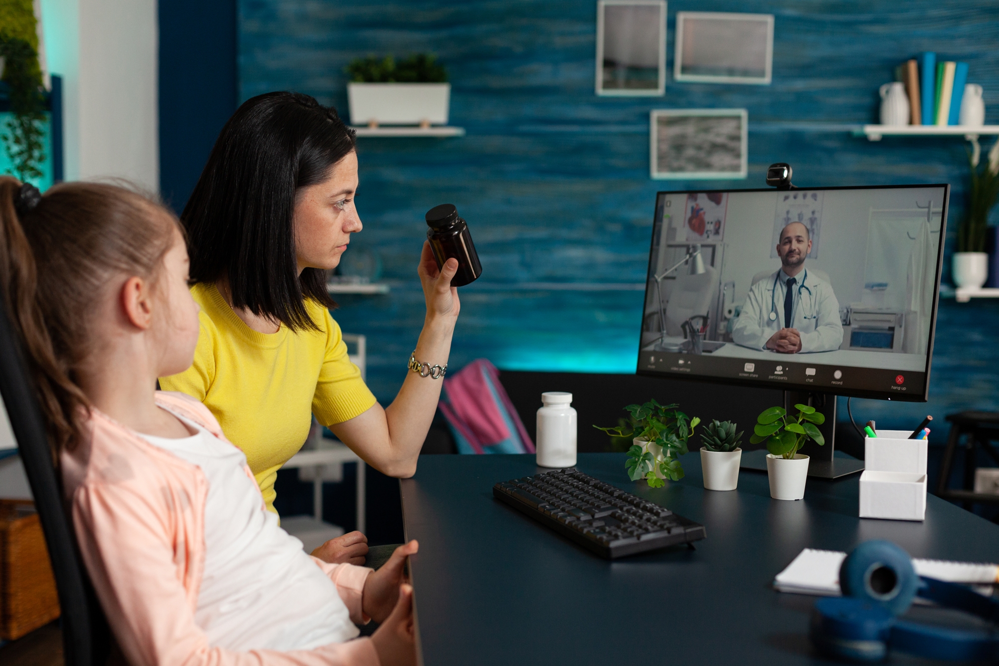 Telehealth (licensed content) - a mother discusses healthcare treatment online